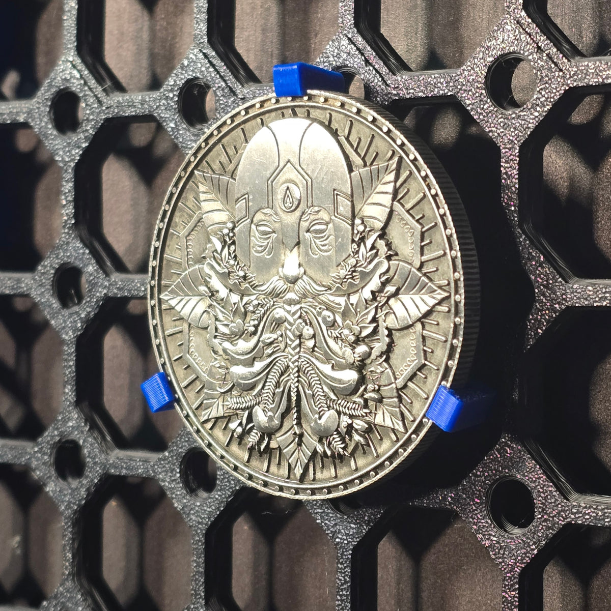 Challenge coin display mounted on a Multiboard panel
